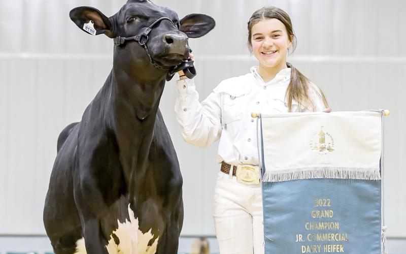 ECCHS freshman Leah Higginbotham, and her dairy heifer, Willow, brought home the county’s first grand championship in the junior commercial dairy show at the 2022 Georgia National Fair. (Photo courtesy of Square One Agri Marketing)