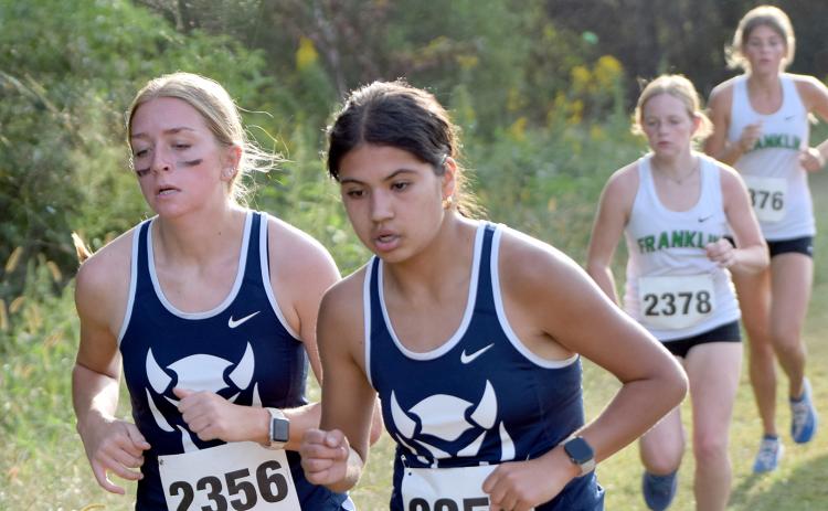 Lady Devil runners Isabella Harpold (left) and Linda Garcia (right) led the Lady Devils in Franklin County Oct. 5. (Photo by Shane Scoggins, Franklin County Citizen Leader)