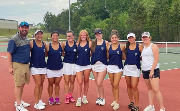 The Lady Devils tennis team poses for a group picture after they beat Social Circle 3-0 in the first round of the GHSA State Playoffs April 17. (Photo courtesy of Elbert County True Blue)