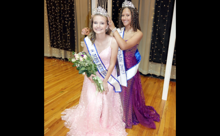 A new Miss ECMS was crowned during the 18th annual Miss ECMS pageant Saturday, April 20 in the Elbert County Middle School auditorium. Pictured crowning new 2024 Miss ECMS Makayla McKnight is 2023 Miss ECMS I'Jianah Whiten. 